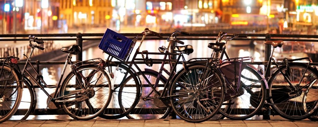 Bikes on an Amsterdam Canal, Netherlands © Ying Feng Johansson | Dreamstime 24133789