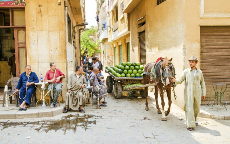 Smoking Shisha at a Street-Side Cafe, Cairo, Egypt © Jackmalipan | Dreamstime34533296