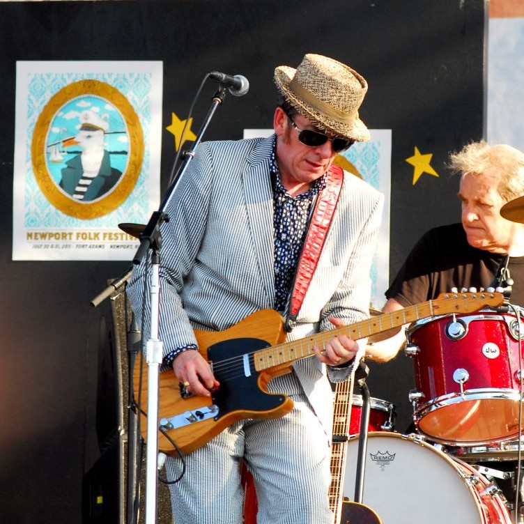 Elvis Costello at the Newport Folk Festival, Rhode Island © Jerry Coli | Dreamstime 20558311